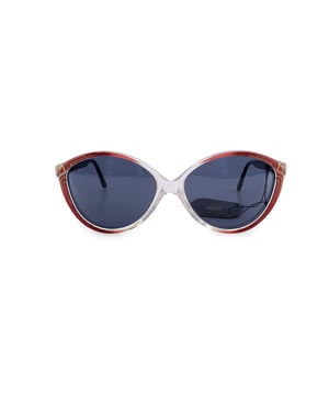 VINTAGE, RRP AS NEW
Soft, sculptural, and unmistakably '80s, the Balenciaga vintage model 2709-RD sunglasses are a rare Parisian dream brought to life. Made in France with unmistakable craftsmanship, this model features black and red acetate frame, subtly translucent and sweetly sophisticated. The cat eye silhouette is balanced by grey-to-pink lenses, offering 100% UV protection while tinting the world with a hint of blush-toned romance. At the ear stems, a refined gold metal Balenciaga logo adds a whisper of luxury-never loud, always elegant. For the collector or the fashion soul drawn to soft glamour with sharp heritage, these sunglasses are a wearable time capsule of 1980s Balenciaga allure. Condition Rating: A - EXCELLENTCondition Details: Gently Used. Lenses and frame in excellent condition. Please check the images carefully. Some show arrows indicating any evident defect. Please ask if you need to know more details or if you have any doubts. Glasses maximum Width: 135mm Glasses Temple 135mm Glasses maximum lens width: 54mm Glasses maximum lens 45mm Glasses bridge width: 15mm Measurments:  width: 135 mm height: 45 mm