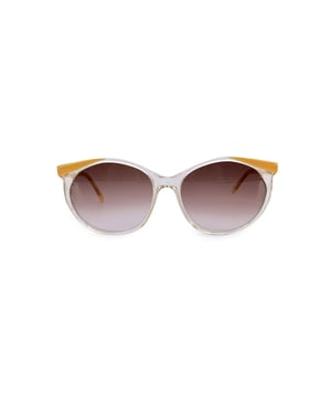VINTAGE, RRP AS NEW
A bold expression of 1980s avant-garde fashion, these vintage Yves Saint Laurent sunglasses, model DANAOS (56/16 - 470), are a rare and radiant find from the golden age of French couture eyewear. Crafted in France, this striking piece features a transparent frame accented with vibrant yellow corners and arms, creating a daring yet refined silhouette that embodies the era's fearless design language.  Fitted with gradient blue lenses, these sunglasses offer both 100% UV protection and an eye-catching color contrast that enhances their retro-futuristic charm. The iconic YSL logos on the temples mark their designer heritage, while the bold palette and sharp lines make the DANAOS model a true statement piece-perfect for collectors or anyone looking to wear a slice of Yves Saint Laurent's visionary legacy. Condition Rating: A - EXCELLENTCondition Details: Gently Used. Lenses and frame in excellent condition. Please check the images carefully. Some show arrows indicating any evident defect. Please ask if you need to know more details or if you have any doubts. Generic case always included, please ask for availability of original case. Glasses maximum Width: 140mm Glasses Temple 130mm Glasses maximum lens width: 58mm Glasses maximum lens 46mm Glasses bridge width: 16mm Measurments:  width: 140 mm length: 130 mm height: 46 mm strap length: 0 mm handle drop: 0 mm