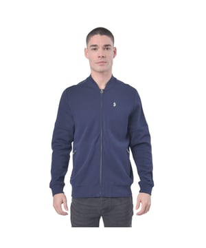 90% katoen, 10% polyester. Stof: Koord, zacht gepigmenteerd. Ontwerp: Logo, eenvoudig. Mouwtype: Met lange mouwen. Manchet: Ribbel. Halslijn: Ribbel, Staande Kraag. Bevestiging: Volledige ritssluiting. Hem: Ribben. S: 38 in. M: 40 in. XL: 44 in. XXL: 46 in.