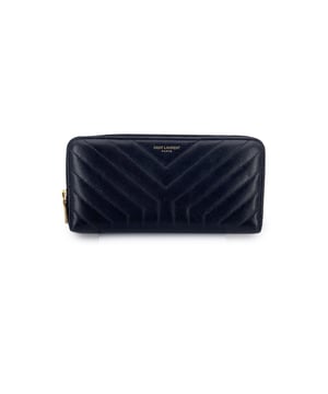 VINTAGE, RRP AS NEW
This beautiful item will come with a Certificate of ity provided by Entrupy. The certificate will be provided at no further cost  There's a certain poetry to a well-made piece - and this Saint Laurent wallet speaks volumes in quiet tones. A classic model, it's crafted in Italy from supple black leather, showcasing the Maison's signature Y-quilted stitching - a detail that feels both iconic and deeply personal to those who know. This isn't just a wallet; it's a companion in time, designed with the elegance that Saint Laurent is revered for.  Unzip the smooth, zip-around closure and you'll find a meticulously arranged interior: full leather lining, multiple side pockets, slots for documents or cards, and a secure zippered compartment for coins or little treasures. It's function wrapped in refinement, built to serve - and age - with grace.  Inside, discreetly engraved, are the words 'Saint Laurent - Made in Italy' along with its serial number, marking it as and uniquely yours. A piece not simply worn, but lived with. Condition Rating: A - EXCELLENTCondition Details: Gently used. Some normal wear of use on leather. Please check the photos carefully and ask if you need to know more details or if you have any doubts.Measurements (cm): Height: 10.2Length: 19.1Box?: No Measurments:  length: 191 mm height: 102 mm