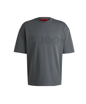 100% Baumwolle. Gewebe: Trikot, Plüsch. Design: Gleichfarbiges Logo. Überschnittene Schulter. Passform: Übergroß. Rundhalsausschnitt. Kurzärmlig. XS: 90,17 cm. S: 93,98 cm. M: 96,52 cm. L: 102 cm. XL: 104 cm.