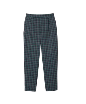 100% Polyester. Stof: Keperstof. Ontwerp: Geruit, Siliconen Logo. Stoftechnologie: Ademend, Stretch. Lengte: 7/8. Waistline: Elastiek. Geschikt voor: Taps toelopend. Gemaakt van gerecycleerde materialen. Zonne-rating: UPF 30+.