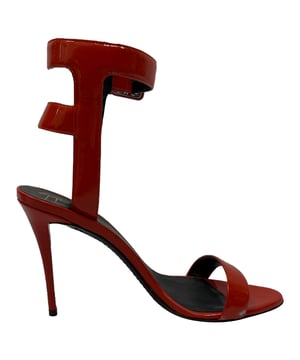 VINTAGE, RRP AS NEW
The Giuseppe Zanotti High Ankle Strap Sandal Heels in red patent leather are a show-stopping fusion of bold color and architectural elegance. With a sculptural stiletto heel, glossy finish, and high ankle strap, they command attention and elevate any ensemble. **Style Tip:** Keep the rest of your look sleek and simple—think a little black dress or fitted monochrome jumpsuit—to let these fiery heels take center stage.

 Giuseppe Zanotti High Ankle Strap Sandal Heels in Red Patent Leather

Condition: Excellent
Signs of wear: No visible signs of wear
Packaging: Box, Dust bag
Color: Red 
Material: Leather | patent leather
Size: IT | 37.5
Measurements: Heel height: 100 mm; Insole length: 270 mm
SKU: TONPUGBSH509156W