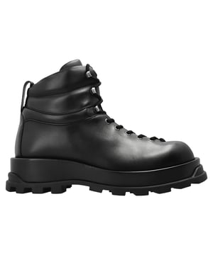 Composition: 100% calf leather  

Inner: Leather
Insole: Leather
Sole: Rubber
Round toe
Front lace-up closure
Pull tab at the rear
Sole height: 3cm Sole height at the highest point: 4cm
Made in  Italy
Gender: MEN
Product code: J50WU0014P4942_001
Code: SHO JS 1 BT SS25 12842