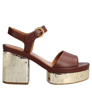 Composition: 100% calf leather  

Inner: Leather
Insole: Leather
Sole: Leather
Heel: 10.0 cm / 25.4 in
Platform: 4.0 cm / 10.16 in
round toe
Logo ankle buckle closure
patent side detail
Gender: WOMEN
Product code: CHC23U783D9_25L
Code: SHO CI 2 SN SS P00001 059
 Measurments:  height: 254 mm
