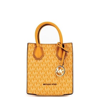 Michael Kors Mercer XS Shopper Crossbody Bag
  Honeycomb Signature PVC material
  Adjustable and detachable crossbody strap
  3 inner card slots
  Gold
  toned MK bag charm
  Magnetic snap closure
  Dimensions: 15.24 cm W x 17.14 cm H x 6.35 cm D
  Suitable for women