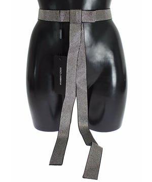 Marca: Dolce & Gabbana.
  Color: Negro.
  Cristal: Transparente.
  Hecho en Italia.
  Material: 16% seda 34% viscosa 35% cristal 15% laton.
  Diseno de arco ancho.
  Adornado con cristales transparentes.
  Color negro sofisticado y versatil.
  Detalles del logotipo.
  Construccion de alta calidad.