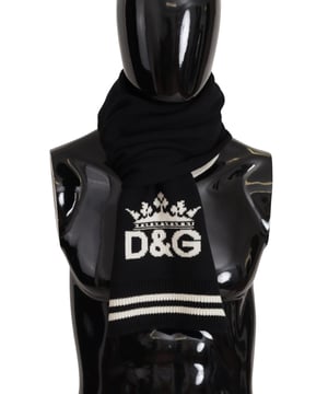 A estrenar con etiquetas.
  Material 100% cachemir.
  Combinacion de colores en blanco y negro con impresion DG.
  Detalles del logotipo de Dolce & Gabbana.
  Hecho en Italia.
  Tamano: 180 cm x 26cm.
  Accesorio perfecto para la moda masculina.