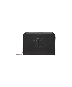 Marca: Calvin Klein.
  Genero: Mujer.
  Tipo: Carteras.
  Temporada: Otono/Invierno.
  Color: negro.
  Cierre: con cremallera.
  Tamano (cm): 8x11x3.
  Codigo del articulo: LV04K1004G.
  Composicion: 100% piel sintetica.
