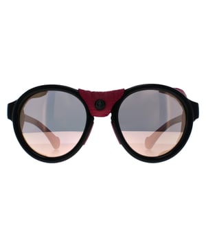 Moncler Round Unisex Shiny Black Pink Smoke Mirror ML0046  Sunglasses are a round style crafted from lightweight acetate . These have removeable leather side inserts for extra protection and the Moncler logo on the temples.