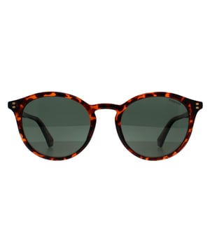 Die Polaroid PLD 6233/S 086 UC havannagrÃ¼n polarisierte Sonnenbrille hat einen zeitlosen, runden Rahmen aus leichtem, umweltfreundlichem Polycarbonat, der den ganzen Tag Ã¼ber Tragekomfort bietet. Ausgestattet mit polarisierten GlÃ¤sern bietet sie 100 % UV-Schutz, reduziert Blendeffekte und verbessert die Sicht bei hellem Wetter. Die schlanken BÃ¼gel sind mit einem dezenten Polaroid-Logo und einem Regenbogen-Detail an der Innenseite des EndstÃ¼cks verziert und verleihen dem Design einen Hauch von PersÃ¶nlichkeit.