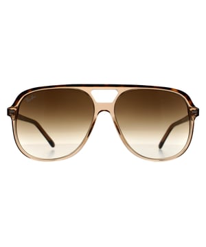 Las gafas de sol Ray-Ban Square para hombre en color habana pulido sobre marrón transparente con montura degradada en marrón claro RB2198 son una sorprendente fusión de estilo moderno y encanto clásico. La montura habana pulida sobre marrón transparente combina a la perfección la audacia con la sutileza, creando un look que transmite seguridad y frescura. Diseñadas para el caballero exigente, estas gafas de sol incorporan lentes degradadas en marrón claro que no sólo mejoran la claridad visual, sino que también desprenden una sofisticación atemporal. Fabricadas con materiales plásticos de calidad, ofrecen durabilidad sin comprometer el estilo ni la comodidad, por lo que son perfectas para llevar a diario o en ocasiones especiales. Siguiendo la tradición de Ray-Ban desde 1937, este par encarna la autenticidad con su distintivo diseño cuadrado, un guiño a la legendaria artesanía de la marca y a su atractivo perdurable. Salga a la calle con estilo y disfrute de una protección y un rendimiento inigualables con estas gafas icónicas.