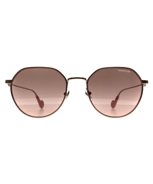 Las gafas de sol Moncler Round Womens Shiny Rose Gold Pink Brown ML0156-K presentan una elegante montura de acetato con un toque moderno, mostrando el icónico logotipo de Moncler en las patillas para un toque de lujo. Las lentes redondas ofrecen estilo y protección, mientras que el sutil degradado añade un toque de encanto.