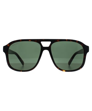 Gucci Aviator Mens Dark Havana Green GG1856S  Sunglasses combines bold shapes with sleek lines, creating a striking design that blends modern luxury with high-performance functionality.