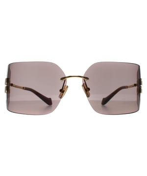 Las gafas de sol sin montura Miu Miu Gold Light Purple Brown MU54YS para mujer presentan una montura atrevida y sin montura que irradia confianza y sofisticación, fabricada en metal de alta calidad para ofrecer una sensación de lujo. Las lentes proporcionan una protección UV superior al tiempo que añaden un toque de glamour, perfecto para cualquier persona a la moda. Con detalles distintivos y el icónico logotipo de Miu Miu sutilmente grabado en las patillas, las gafas de sol MU54YS son un accesorio imprescindible para quienes se atreven a marcar tendencia. Sea el centro de atención y deje que su estilo brille con Miu Miu.