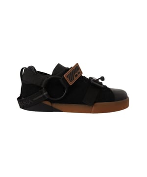 Gloednieuw met labels
  100% Authentieke Dolce & Gabbana sneakers
  Laag casual ontwerp
  Gemaakt van leer katoen en wol
  Zilveren en bruine kleur
  Veter
  en gespbandsluiting
  Rubberen zool voor comfort
  Details van het logo
  Vervaardigd in Italie