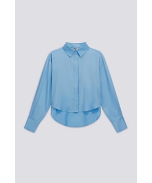 Camisa oversize de mujer con una actitud contemporánea. Una solución de diseño minimalista que realza la cintura gracias al corte recortado.   Características principales:  Popelín elástico Corte oversize Bordado de gas en la espalda