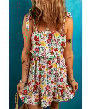 Red floral print
  Knotted straps
  Cinched waist
  Ruffled hem
  Mini length
Material: 100% Viscose