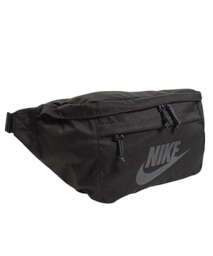 Stay organized and stylish on the go with the Nike Black Crossover Bag. Made from durable 100% polyester, this bag features a spacious 10-litre main compartment with a secure zip fastening to keep your essentials safe. An additional front pocket with zip closure offers quick access to smaller items. The adjustable strap with buckle clip fastening ensures a comfortable, customizable fit for all-day wear. Boldly branded with a large Nike Swoosh logo, this crossover bag combines practicality with iconic style, making it the perfect accessory for daily use or active lifestyles
