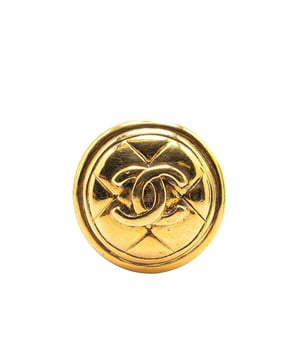 This brooch features a gold-tone metal body and a back pin closure.Brand: Chanel VintageCondition: PrelovedType: Costume BroochRating: B+Main Material: MetalDimensions (LxWxD): 3x3x0Comments: Exterior Back Scratched. Lock Scratched. Exterior Front Scratched.