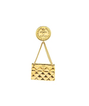 This brooch features a metal body and a back pin closure.Brand: Chanel VintageCondition: PrelovedType: Costume BroochRating: B+Main Material: MetalDimensions (LxWxD): 8x3.5x0Comments: Exterior Back Scratched. Lock Scratched. Exterior Front Scratched.