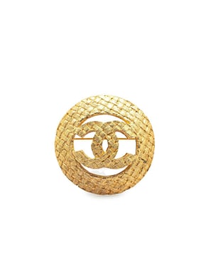 This brooch features a gold-tone metal body and a back pin closure.Brand: Chanel VintageCondition: PrelovedType: Costume BroochRating: B+Main Material: MetalDimensions (LxWxD): 3.6x3.6x0Comments: Exterior Back Discolored Scratched. Lock Scratched.