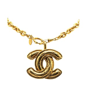 This necklace features a gold-tone chain a gold-tone quilted CC pendant and a spring ring closure.Brand: Chanel VintageCondition: PrelovedType: Costume NecklaceRating: B+Main Material: MetalDimensions (LxWxD): 84.3x4.2x0Comments: Exterior Back Scratched. Lock Scratched. Exterior Front Scratched. Exterior Front stained with Other. Exterior Handle Scratched.