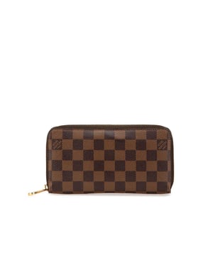 Cuerpo de lona Damier ebene.
  Cierre de cremallera.
  Bolsillos interiores con cremallera y abiertos.