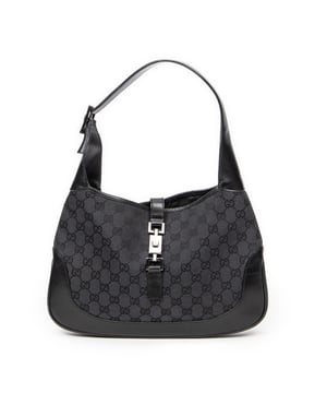 Gucci Tassen Jackie O Hobo  Schoudertas in de Zwart Doek in de Zilver  hardware. Het product is in In Uitstekende Staat (A).
  Afmetingen: 33x21x4 cm 
  Inclusief accessoires: None
  Opmerkingen over de buitenkant: Lichte krassen op leer
Opmerkingen over de band/het handvat: Lichte krassen
  BrandCo Paris vindt zeldzame artikelen in de beste staat voor ongelooflijke prijzen. Het is de moeite waard om geduldig te zijn! Koop met vertrouwen: alle artikelen van BrandCo Paris worden zorgvuldig geselecteerd en geverifieerd door ons team van experts.

  Alle artikelen worden geleverd met een certificaat van echtheid en verpakt door BrandCo Paris.

  Classificatietabel voor de conditie van het artikel:

  N (als nieuw)
  AA (perfecte staat)
  A (uitstekende staat)
  AB (zeer goede staat)
  B (goede/redelijke staat)