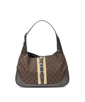 Gucci Tassen Jackie O Hobo  Schoudertas in de Bruin Doek in de Zilver  hardware. Het product is in In Uitstekende Staat (A).
  Afmetingen: 33x21x4 cm 
  Inclusief accessoires: None
  Opmerkingen over de buitenkant: Lichte krassen op leer
Opmerkingen over de band/het handvat: Lichte krassen
  BrandCo Paris vindt zeldzame artikelen in de beste staat voor ongelooflijke prijzen. Het is de moeite waard om geduldig te zijn! Koop met vertrouwen: alle artikelen van BrandCo Paris worden zorgvuldig geselecteerd en geverifieerd door ons team van experts.

  Alle artikelen worden geleverd met een certificaat van echtheid en verpakt door BrandCo Paris.

  Classificatietabel voor de conditie van het artikel:

  N (als nieuw)
  AA (perfecte staat)
  A (uitstekende staat)
  AB (zeer goede staat)
  B (goede/redelijke staat)