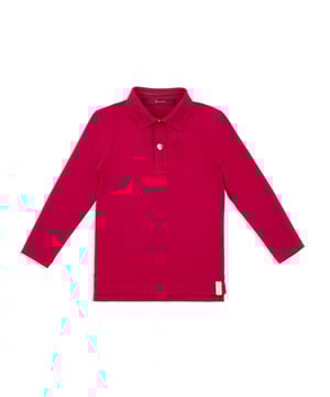 Polo de manga larga de punto de algodón. Emblema bordado a la altura del pecho. Botones de madreperla. Cuello y puños de canalé.