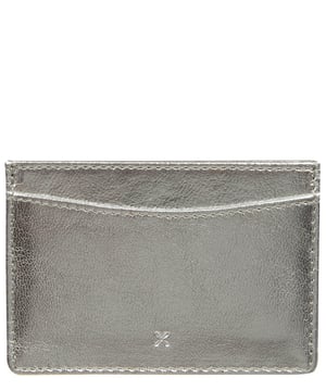 Simple, sleek and stylish, the 'Annalisa' card holder from NiNa Amora is crafted from high quality natural leather with a super soft to the touch and smooth finish. This card holder is as stripped back as it can be with two card slots on either side and a third slot in the middle. This is perfect on its own or as additional storage for your larger purse such as swapping out the card holder on the 'April' for a customizable look. This style is finished with the NiNa Amora logo blind embossed for an elegant finishing touch.