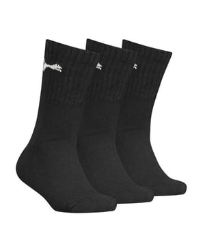 3er-Pack. 77% Baumwolle, 21% Polyamid, 2% Elastan. Gewebe: Dobby, Weiche Haptik. Marke: Puma. Design: Logo, gerippt. Gewebetechnik: Stoßdämpfend. Sohle: gepolstert. Flache Naht an der Zehe.