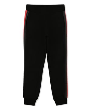 The brand's monogram is the defining feature of these cotton fleece sweatpants. It is embroidered on the right rear pocket. Contrasting sidebands are printed on both legs. Two slit pockets on the front and one on the back. Ribbed waistband and bottom cuffs.