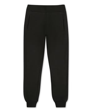 The brand's lettering is the defining feature of these cotton fleece sweatpants. It is printed all-over the right rear pocket. Two slit pockets on the front and one on the back. Ribbed waistband and bottom cuffs.