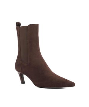 Meet Orie, this season's must-have suede ankle boots. Set on an eye-catching slanted heel for extra height and a modern twist, this stylish pair boasts a chic pointed toe and elasticated side panels for added comfort. Whether you're dressing up denim or adding to a tailored look, these boots bring the perfect balance of sophistication and statement-making style.