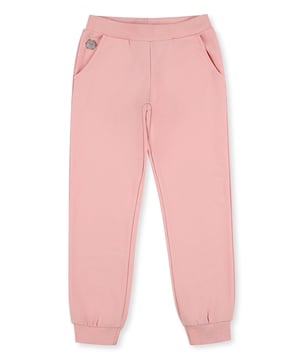 These most classic cotton fleece jogging pants get a decisive Plein twist thanks to the rhinestone skull printed on the back. Two slit pockets. Ribbed waistband and bottom cuffs.