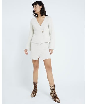 Knitted, Wrap design, Elasticated waist, Mini length