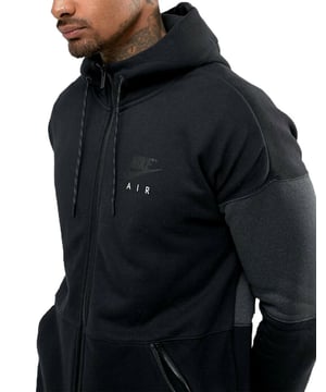 Stay warm and stylish with the Nike Air Cotton Fleece Hoodie in a sleek black and grey colourway. Made from soft, heavyweight cotton fleece, it offers all-day comfort with a premium feel. Featuring the iconic Nike Air logo for a bold, sporty edge, this hoodie includes a drawstring hood, ribbed cuffs and hem, and a spacious kangaroo pocket for practicality. Perfect for layering in cooler weather or adding a streetwear vibe to your everyday look.