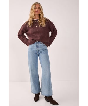 Oversized fit for ultimate comfort and style
        Crew neck design for a classic look
        Ribbed cuffs and hem for a snug fit
        Dropped shoulders for a relaxed silhouette
        Versatile knitted texture suitable for various occasions
    
    This NastyGal Oversized Crew Neck Sweater is the epitome of casual chic. The roomy fit and soft knitted fabric combine to create a garment that's both comfortable and stylish. Perfect for those laid-back days when you want to look effortlessly cool, this sweater can be dressed up or down with ease. Layer it over a crisp white shirt for a preppy twist, or pair it with your favourite jeans and trainers for a classic weekend look. The versatile design makes it ideal for family gatherings, coffee dates with friends, or even casual Fridays at the office. For a trendy contrast, try wearing it with a delicate lace skirt and chunky boots, as shown in the image. Add some statement jewellery to complete your ensemble and you'll be ready to tackle any casual event with confidence and flair.