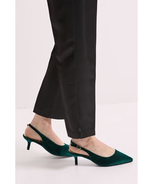 Luxurious velvet finish for a touch of texture and sophistication
        Pointed toe design creates an elegant silhouette
        Comfortable kitten heel measuring between 2.5-4.5cm for all-day wearability
        Slingback strap with adjustable buckle fastening for a secure fit
        Wide fit design offers additional comfort for those who need extra room
    
    The Dova slingback court shoes combine comfort and style in perfect harmony. Crafted in sumptuous velvet with a pointed toe and delicate kitten heel, these wide fit shoes are designed to flatter whilst providing the extra room you need. The adjustable slingback strap ensures a secure fit that won't slip throughout your day. Style these versatile heels with tailored trousers for a polished office look, or pair with your favourite jeans and a blouse for weekend brunches with the girls. The modest heel height makes them ideal for family gatherings or casual daytime events where you want to look put-together without sacrificing comfort. These Dorothy Perkins shoes will quickly become your go-to for occasions when trainers feel too casual but higher heels would be impractical.