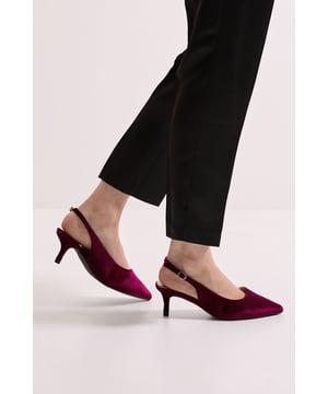 Luxurious velvet finish for a touch of texture and sophistication
        Pointed toe design creates an elegant silhouette
        Comfortable kitten heel measuring between 2.5-4.5cm for all-day wearability
        Slingback strap with adjustable buckle fastening for a secure fit
        Wide fit design offers additional comfort for those who need extra room
    
    The Dova slingback court shoes combine comfort and style in perfect harmony. Crafted in sumptuous velvet with a pointed toe and delicate kitten heel, these wide fit shoes are designed to flatter whilst providing the extra room you need. The adjustable slingback strap ensures a secure fit that won't slip throughout your day. Style these versatile heels with tailored trousers for a polished office look, or pair with your favourite jeans and a blouse for weekend brunches with the girls. The modest heel height makes them ideal for family gatherings or casual daytime events where you want to look put-together without sacrificing comfort. These Dorothy Perkins shoes will quickly become your go-to for occasions when trainers feel too casual but higher heels would be impractical.