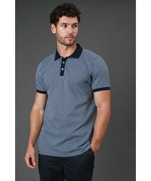Distinctive abstract geometric pattern throughout for a modern twist on classic polo styling
        Contrast collar and sleeve cuffs add refined detailing to the design
        Three-button placket for adjustable neckline comfort
        Soft cotton fabric ensures breathability and all-day comfort
        Regular fit silhouette offers ease of movement without sacrificing style
    
    This Burton abstract geo polo shirt combines timeless appeal with contemporary pattern work, making it a versatile addition to your casual wardrobe. The contrast collar and cuffs create a smart finish that works brilliantly when paired with dark trousers as shown, or with your favourite chinos for weekend outings. Perfect for casual gatherings at the pub with mates or family barbecues, this polo offers that sweet spot between relaxed and put-together. For a complete look, team with dark jeans or chinos and clean white trainers - ideal for those occasions when you want to look effortlessly stylish without appearing overdressed. The breathable cotton construction ensures comfort throughout the day, whether you're watching the match or enjoying a casual lunch out. Machine washable at 30 degrees, this polo maintains its shape and pattern with proper care.