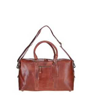 This premium full-grain leather holdall combines style and function with a spacious main compartment, two interior pockets for organisation, sturdy handles with brass hardware, and an adjustable, detachable shoulder strap. Fully lined with branded fabric, it measures (L) 54 cm (W) 19 cm (H) 32 cm with a 32 cm shoulder strap drop length.