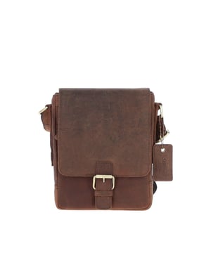 This compact leather flap over bag blends timeless craftsmanship with everyday practicality, making it ideal for city outings or casual wear. It features a spacious main compartment secured with a flap and magnetic closure, along with 2 outer zip pockets for added storage. The design is finished with elegant gold-coloured hardware and clean, structured lines. Its adjustable strap, with a drop length of 51–70 cm, offers flexibility for both crossbody and shoulder wear. Dimensions: (L) 19 cm x (W) 5.5 cm x (H) 25 cm.