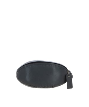 Add a touch of character to your travel kit with this unique rugby ball-shaped leather washbag. Crafted in smooth leather with hand-stitched detail and gold-coloured hardware, it combines eye-catching design with practical function. Despite its compact size, it offers a spacious main compartment with a secure zip closure—perfect for storing toiletries and grooming essentials. Ideal for stylish travellers or as a thoughtful gift for sports enthusiasts. Dimensions: (L) 29 cm x (W) 12 cm x (H) 12 cm.