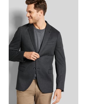 Das elegante Reverskragensakko setzt ein Statement. Das Sakko ist mit Pattentaschen, einer Brusttasche und einem Clutch Pin am Revers ausgestattet. Das Jersey-Sakko mit einer High-Stretch-Funktion überzeugt mit seiner bedruckten Kleindessinierung. Damit kann man nicht nur im Büro, sondern auch auf diversen Veranstaltungen punkten.