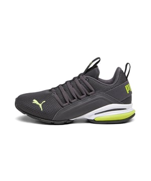 PRODUCT STORY: The Axelion Mesh shoes are style and comfort combined. Featuring a motion-control midsole, exaggerated lacing and a soft knit upper, the PUMA Cat logos round out the look. DETAILS: Low boot; Knit upper; Non-marking rubber outsole; TPU Shank for support and motion control through the heel and midfoot; Exaggerated lacing; PUMA Cat Logo on tongue; PUMA Cat Logo on toe; PUMA Youth: recommended for older kids between 8 and 16 years.
