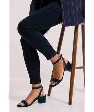 Minimalist open-toe sandals with slim ankle straps
Faux leather upper in a sleek black finish
Mid block heel for a modest yet stylish lift
Buckle fastening for an adjustable fit
faux leather lining for breathability

Effortlessly chic, these barely-there sandals from Dorothy Perkins are perfect for elevating your casual looks. The mid block heel offers a comfortable yet trendy boost, while the minimalist design with slim ankle straps exudes understated elegance. Style them with a floral midi dress for a charming daytime ensemble, or pair them with tailored trousers and a camisole for an evening out with friends. Their versatility makes them a must-have for the modern woman's wardrobe.