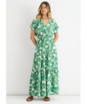 Entdecken Sie mühelosen Stil mit unserem grünen Maxikleid mit elastischem Bund und Blumenmuster. Der bequeme elastische Bund schmeichelt Ihrer Figur, während das lebhafte grüne Blumenmuster ein mutiges Statement setzt. Perfekt für Sommerausflüge oder mit Accessoires für Abendveranstaltungen – dieses vielseitige Maxikleid passt sich Ihren Bewegungen an und bietet den ganzen Tag über Komfort.
